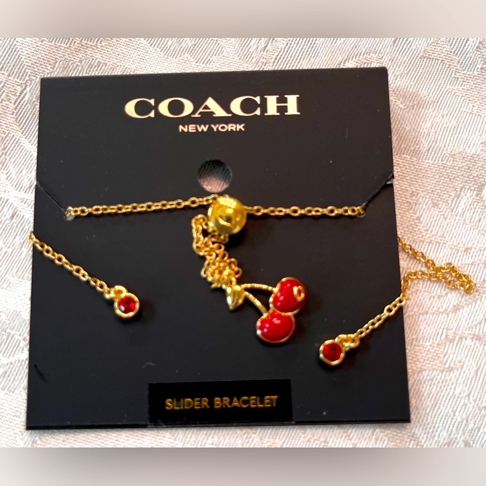 Coach Gold and Red Cherry Slider Bracelet Lariet